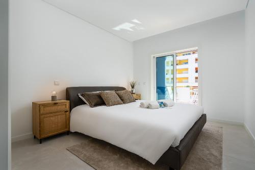 White Ocean Home by Real Life Concierge