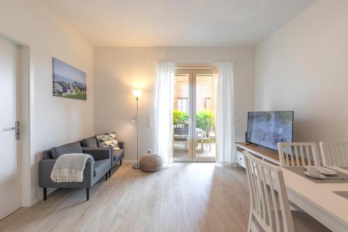 Wohnen am Südstrand - Ferienwohnung 0 1