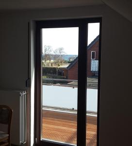 Wohnung Nixe mit Meerblick - Haus Hopp