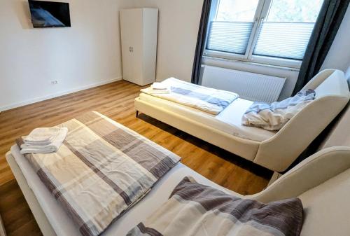 Zentrale 2 Zimmer Wohnung für 4 Personen mit Parkplatz + Smart Tv