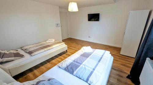 Zentrale 2 Zimmer Wohnung für 4 Personen mit Parkplatz + Smart Tv