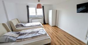 Zentrale 2 Zimmer Wohnung für 4 Personen mit Parkplatz + Smart Tv