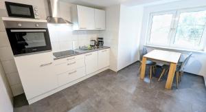Zentrale 2 Zimmer Wohnung für 4 Personen mit Parkplatz + Smart Tv