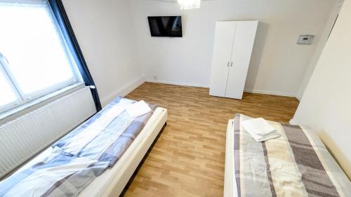 Zentrale Wohnung für 4 Personen mit Parkplatz & Smart Tv