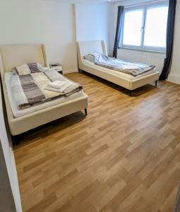 Zentrale Wohnung für 4 Personen mit Parkplatz & Smart Tv