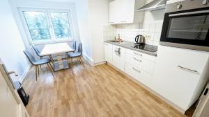 Zentrale Wohnung für 4 Personen mit Parkplatz & Smart Tv
