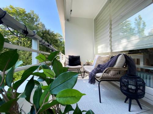 Zentrales strandnahes Design-Apartment mit Balkon und Parkplatz