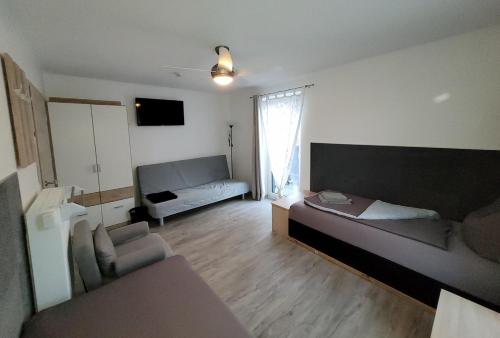 Apartment E - AM KORNFELD mit Raumreinigung und Wäscheservice