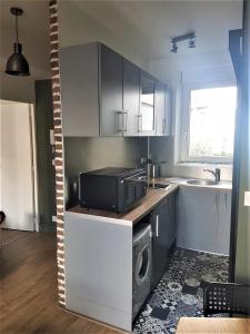 Appartement proche centre entièrement rénové avec le cachet de l'ancien
