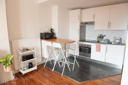 Appartement spacieux avec balcon et parking