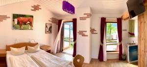Appartementhaus „die Kuh am See“ (vormals Haus St. Leonhard)