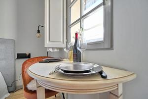 Au cœur des Papes, dans bâtisse de charme studios & appartements en cœur de ville
