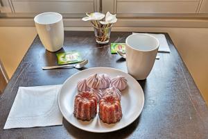 Au cœur des Papes, dans bâtisse de charme studios & appartements en cœur de ville