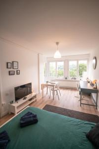 ESPACE 400 - Cosy, lumineux, vue sur la ville - TV & WIFI