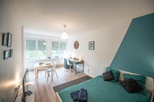 ESPACE 400 - Cosy, lumineux, vue sur la ville - TV & WIFI