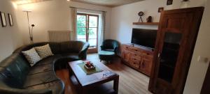 Ferienwohnung Haus Alpenrebe