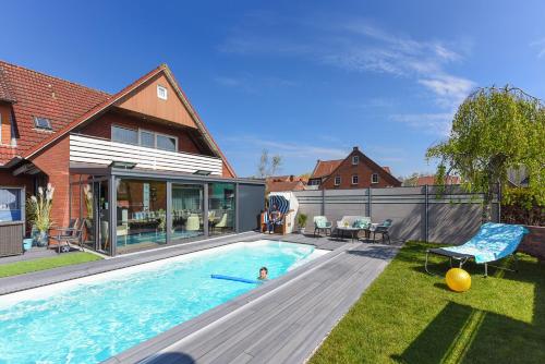 Ferienwohnung Haus zum Seehund mit Pool