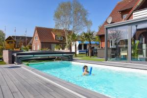 Ferienwohnung Haus zum Seehund mit Pool