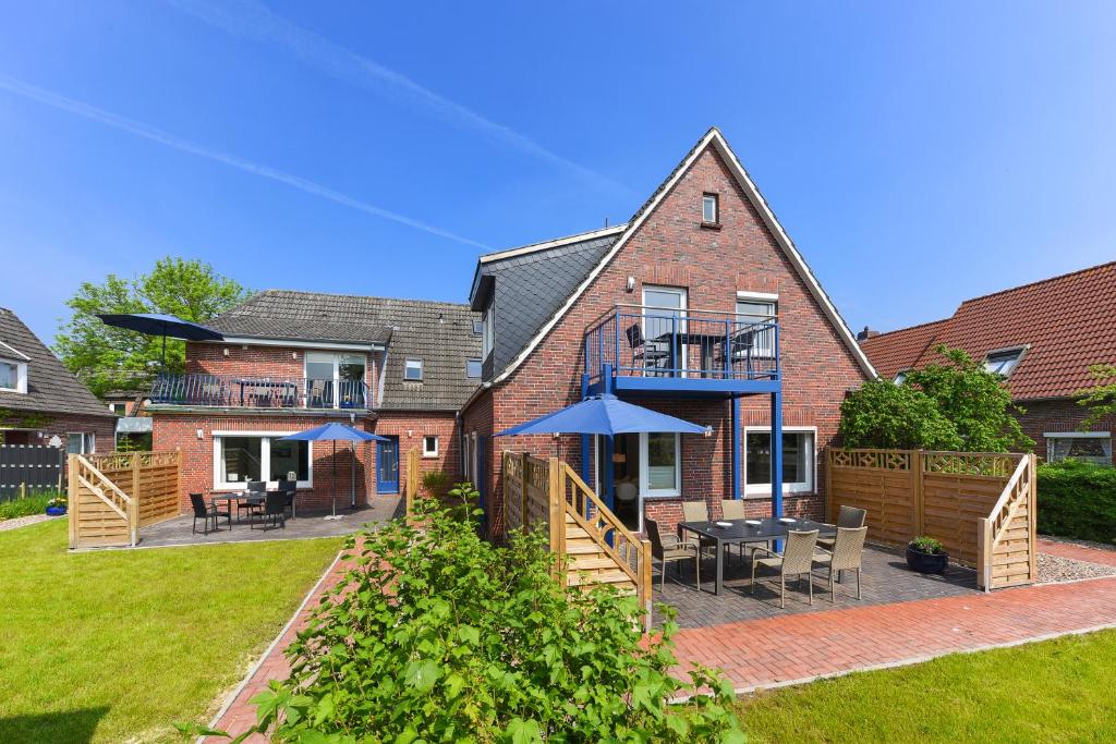 Ferienwohnungen Blaues Haus Wiesenweg 7, 26427 Bensersiel