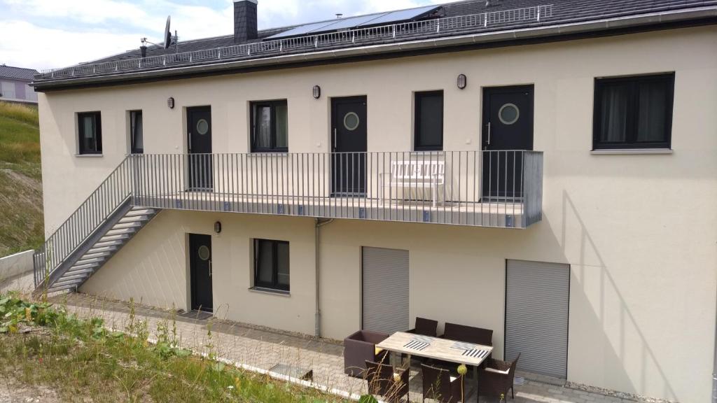 Appartements Ferienwohnungen direkt am See Hafenplatz 2 bootshaus.one 06249 Mücheln