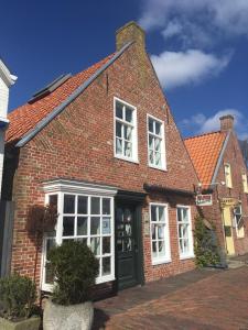 Appartements Kapitänshaus mit Hafenblick 3 Sielstraße 26736 Greetsiel Basse-Saxe