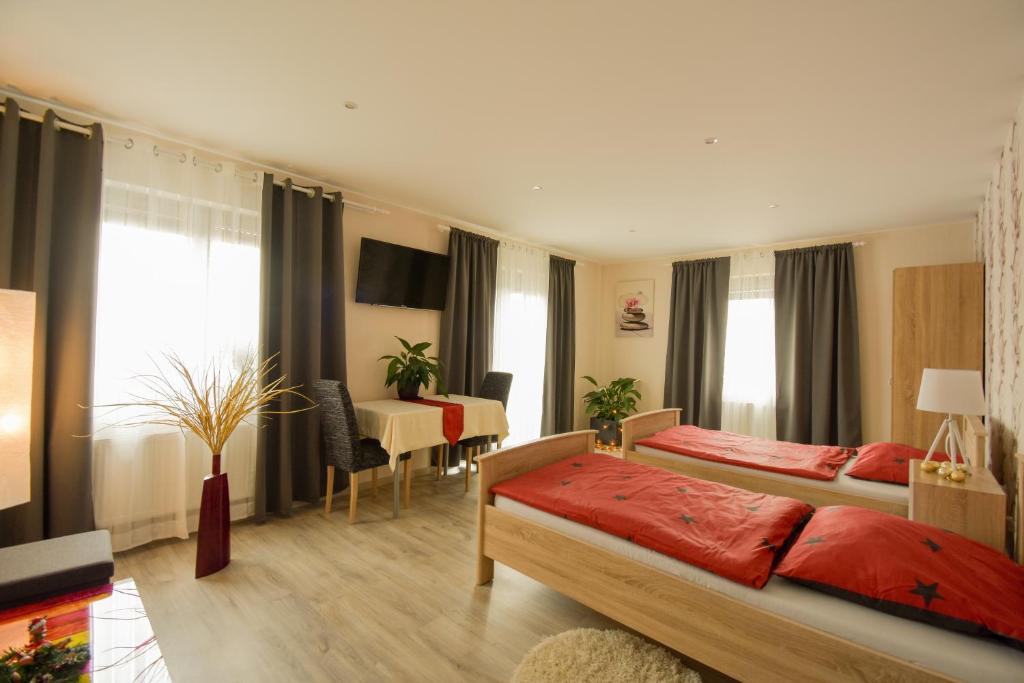Mainzimmer - Business Apartments 35 Weinbergweg, 97907 Hasloch