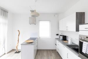 Moderne 2 Zimmer Ferienwohnung mit Dachterrasse - 95qm