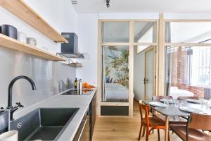 Appartements NEW Loft Apartment in the Heart of Paris - An Ecoloflat 77 Rue du Faubourg Saint-Denis 75010 Paris Île-de-France