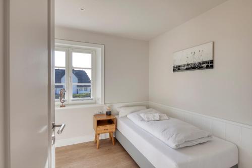 Rantum Dorf - Ferienappartments im Reetdachhaus 3 & 4