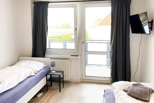 Renovierte Work & Stay Apartments mit Balkon in Bitterfeld-Wolfen