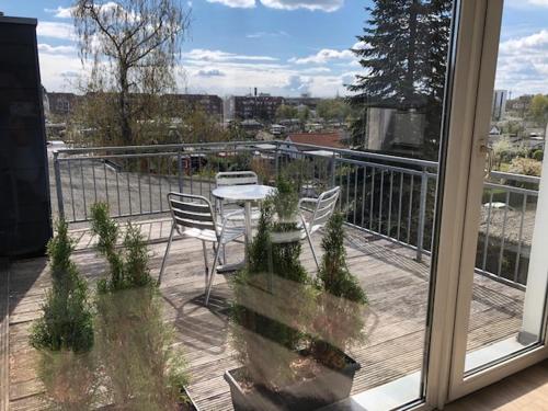 studio b - Sunny City Business Apartment with roof-top terrace for 2-4 guests