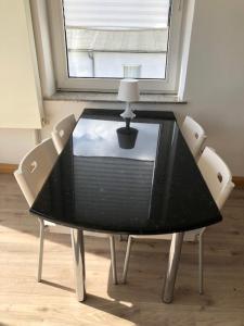 studio b - Sunny City Business Apartment with roof-top terrace for 2-4 guests
