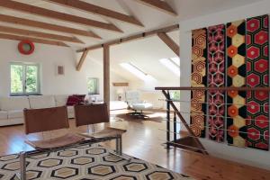 Villa am Trumpf - Design-Appartements im Naturgarten am See
