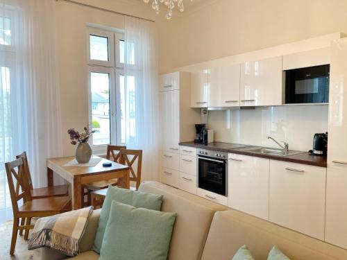 Villa Jenny - Ferienappartement 1 mit Meerblick