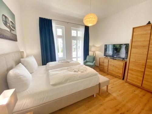 Villa Jenny - Ferienappartement 1 mit Meerblick