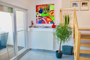 Zwei Ferienwohnungen Anker & Leuchtturm direkt in Steinhude, Wallbox für Elektroauto, Balkon, Free WLAN , Privater Parkplatz,