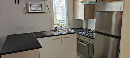 Camping Assist' Mobil Home 465 - Mobil home neuf 3 chambres dressing tout confort domaine de Dugny route de chambon Onzain