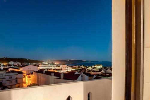 Nazaré Hostel - Rooms & Dorms