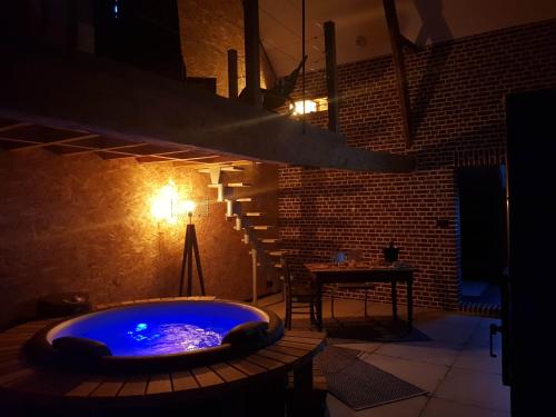 Au Soleil Vert - Chambre de charme avec spa et sauna privés