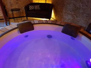 Au Soleil Vert - Chambre de charme avec spa et sauna privés
