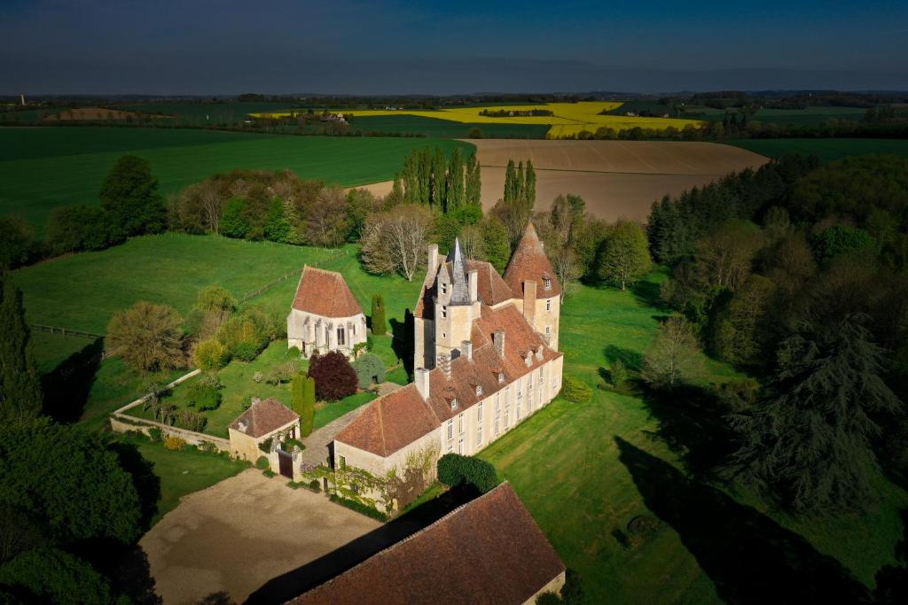 Chambre jaune MANOIR DE LA VOVE Perche La Vove, 61400 Corbon