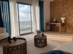 Chambre privée dans maison face mer