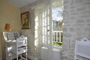 B&B / Chambre d'hôtes Le Puits Sainte Claire 17 Grande Rue 17170 Courçon -1