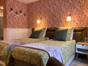 B&B / Chambre d'hôtes Les Orchidées Chambre d’hôtes les Orchidées 10 Rue Loume 64270 Salies-de-Béarn Aquitaine