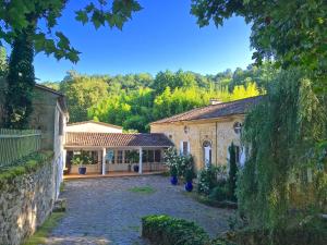 B&B / Chambre d'hôtes Moulin de Rioupassat Chambres d'Hôtes de Charme Moulin de Rioupassat D123 33420 Rauzan Aquitaine