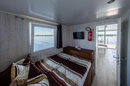 Hausboot Ferienwohnung auf dem Wasser