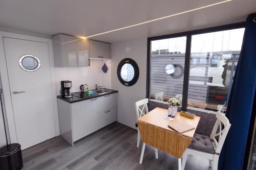 Hausboot Fjord Aquila mit Dachterrasse in Wendtorf