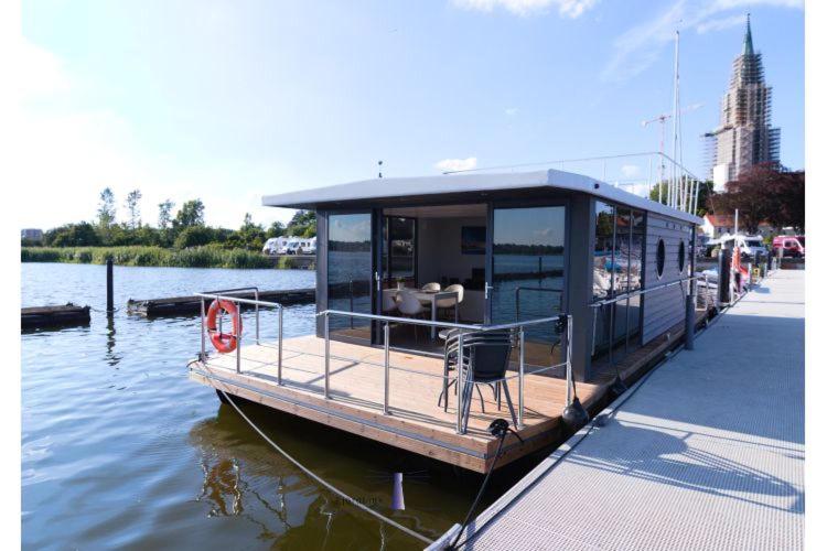 Bateau-hôtel Hausboot Fjord Aries mit Dachterrasse in Schleswig 5 Am Hafen 24837 Schleswig