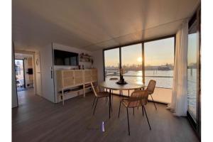 Hausboot Fjord HAVEN mit Biosauna in Barth
