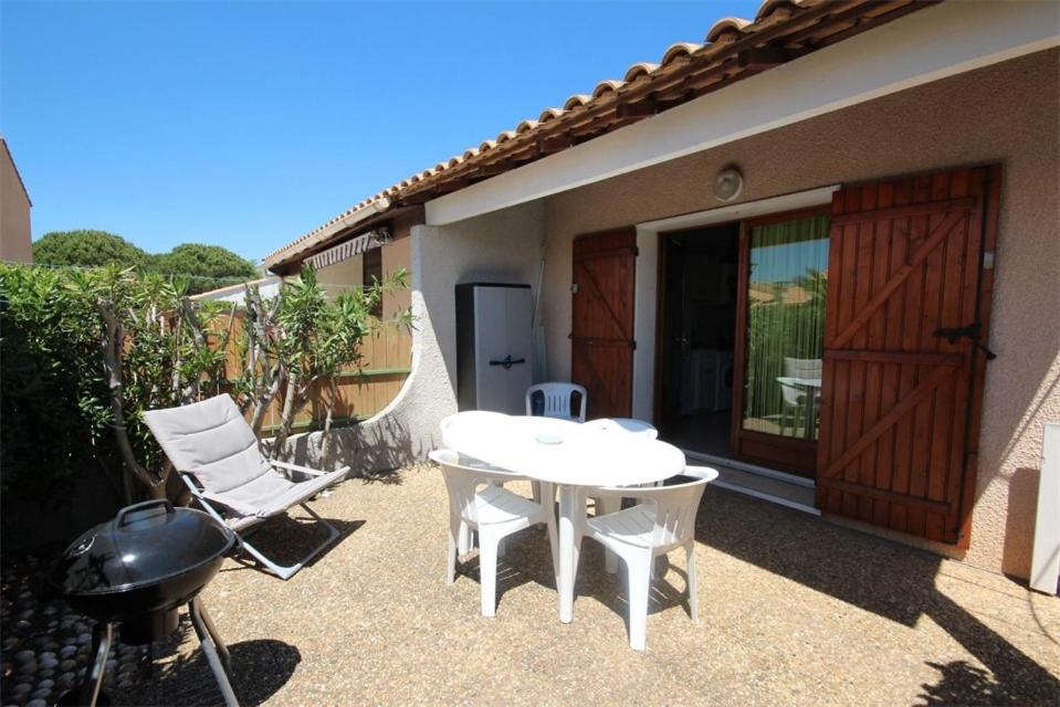 Villa Belle villa climatisée 4 couchages terrasse parking dans résidence sécurisée avec piscine commune 400m de la mer LRJP11 AVENUE DU GRAND SALAN, 34420 Portiragnes